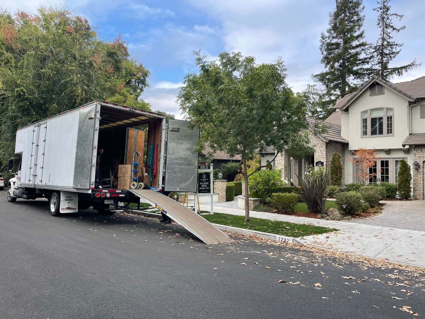 Silicon Valley Moving truck with ramp deployed at a senior residence for a downsizing move